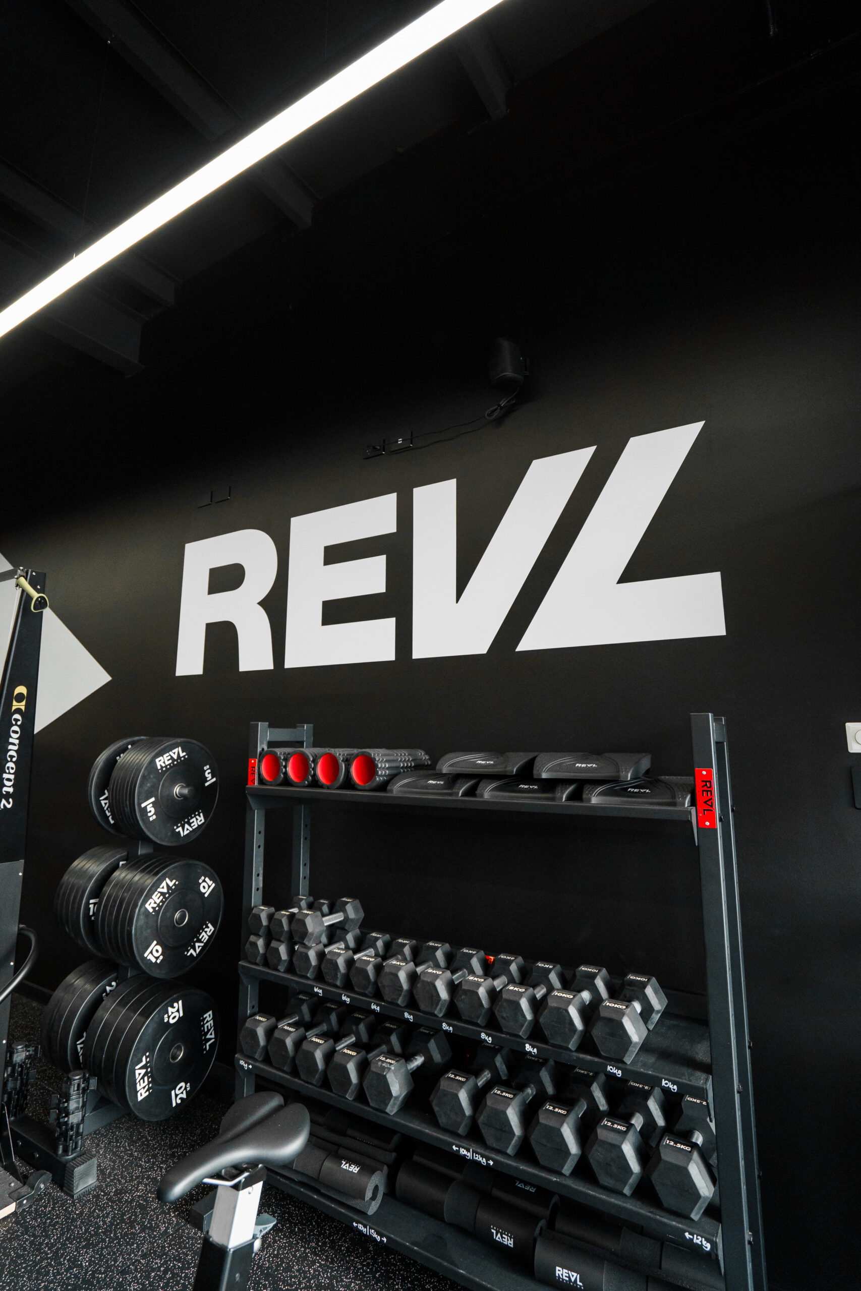 REVL studio with branded wall and equipment